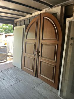 Pair of Wood Exterior Front Doors Mediterranean Style Arched each is 36”x94” - $600 for the pair