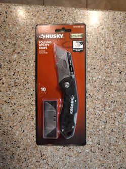 Husky folding utility knife with 10 blades