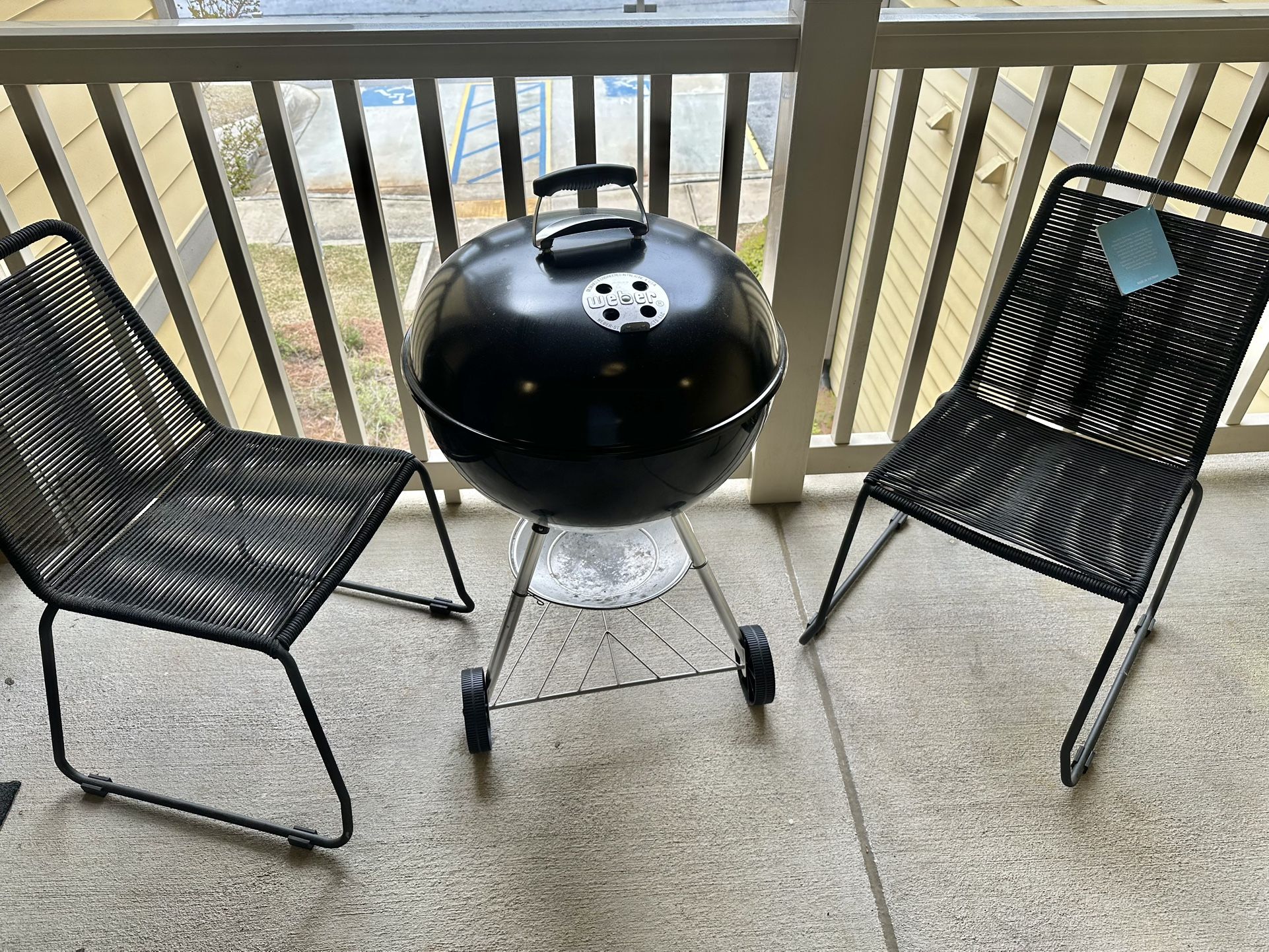 Weber Original Kettle 22-Inch Charcoal Grill - Black & outdoor chairs