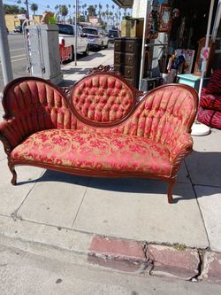 Victorian-style reproduction parlor sofa