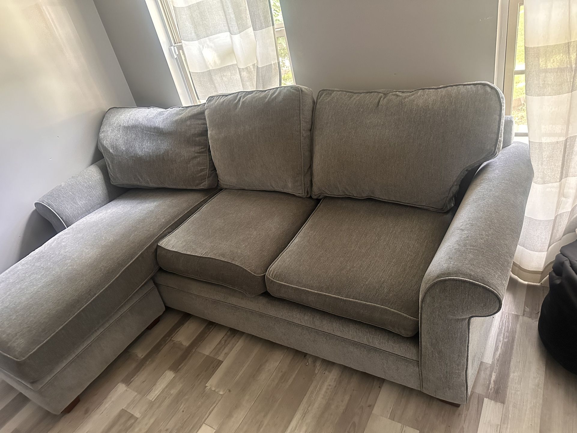Sectional sofa with removable ottoman