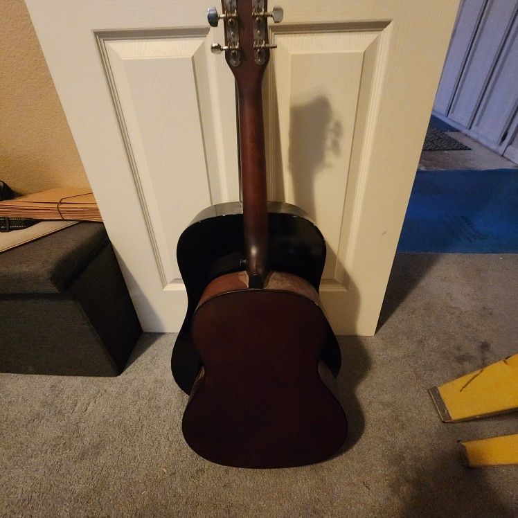 Two regular size guitars and One First Act