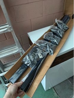 Universal fit roof rack for rails