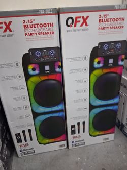 Double 15" woofers Bluetooth party speaker by QFX.  Free 🎤.  Brand new