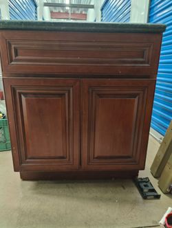 Stand alone wooden cabinet w/granite top