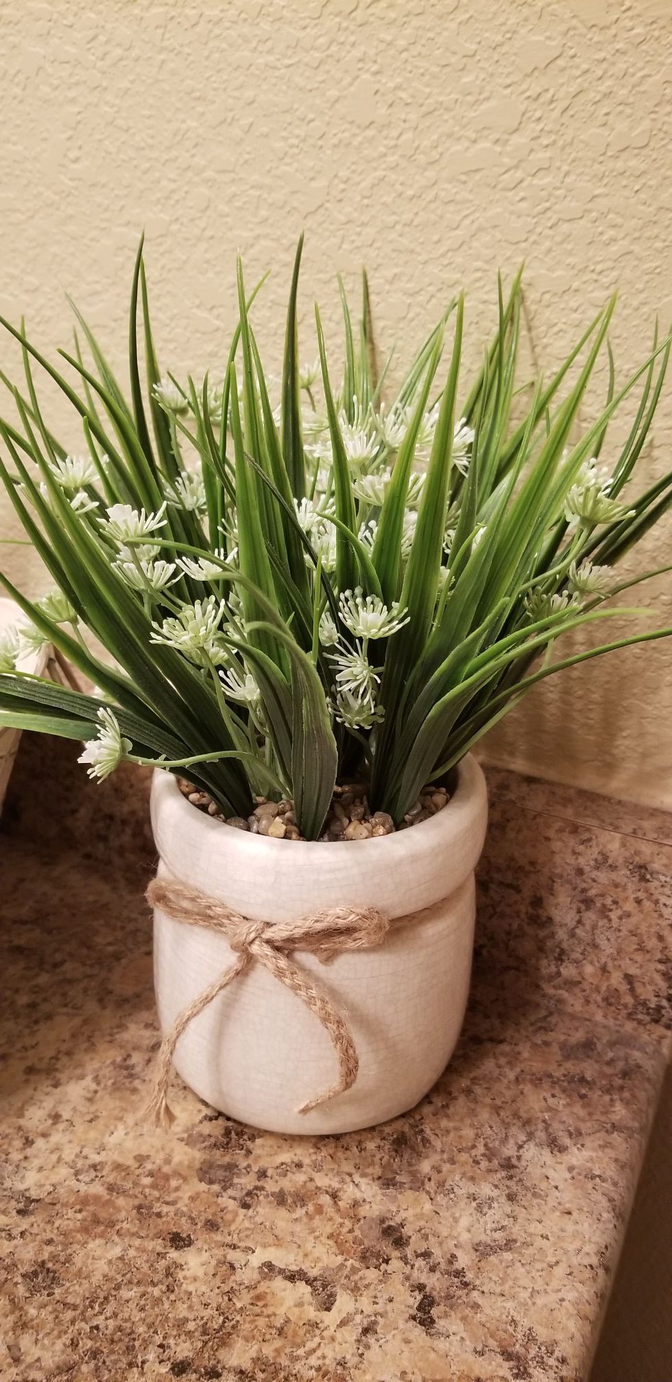 Artificial plant with white pot