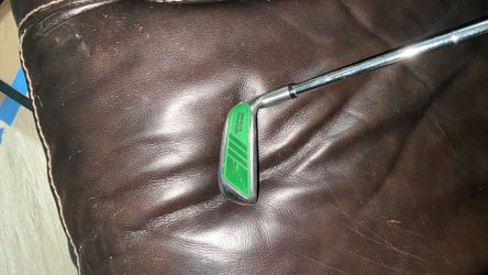 Square strike chipper/wedge with large super strike putter grip
