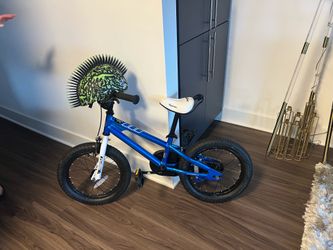 blue RoyalBaby Freestyle kids' bike with 14-inch wheels