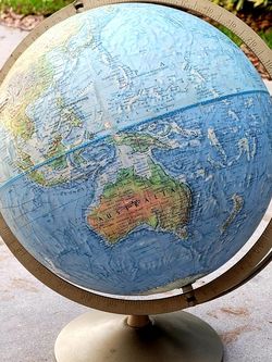 $25. Vintage World Globe. Metal Base. Good Condition.
