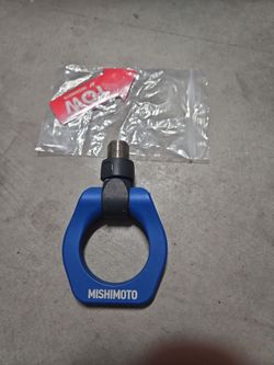 Mishimoto tow hook. Blue
