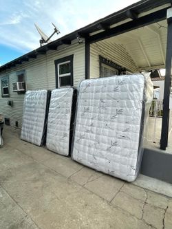 Queen Size Mattress Pillow 12" Thick.     New Mattress in a plastic sealed