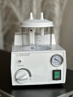 Veterinary suction aspirator