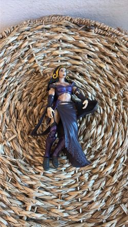 Purple actions figure.