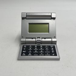 Collapsible Travel Alarm clock, calculator, world time, calendar, 3.5” Folded