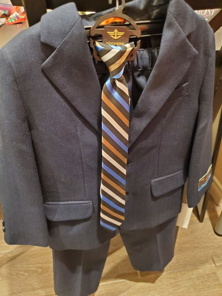 Brand new child's suit with tie