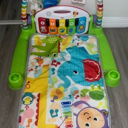 Fisher-Price Deluxe Kick 'n Play Juguete de piano para niños, na