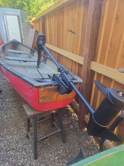 Red Canoe with newTrolling Motor