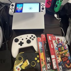 Nintendo switch OLED with Games & Remotes