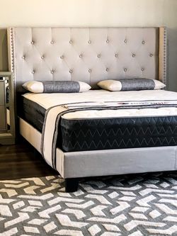 Upholstered Wingback Bed Frame with Tufted Headboard included is new mattress (free delivery)