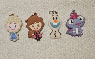 DISNEY FROZEN# 1,#2 LOT OF 4 KEYCHAIN CHARMS APROX 2"INCHES IN GOOD CONDITION