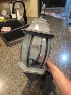 Outdoor black coach lantern with motion sensor