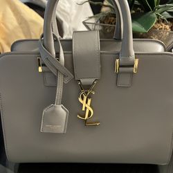 Saint Laurent Paris Baby Cabas 2way shoulder bag in grey smooth calfskin leather with gold-tone hardware.