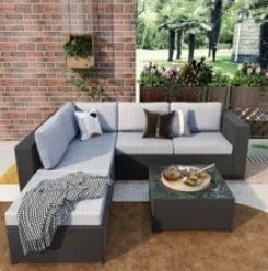 Blasa 4-Piece Rattan Sofa Seating Group with Cushions + Matching Storage Case