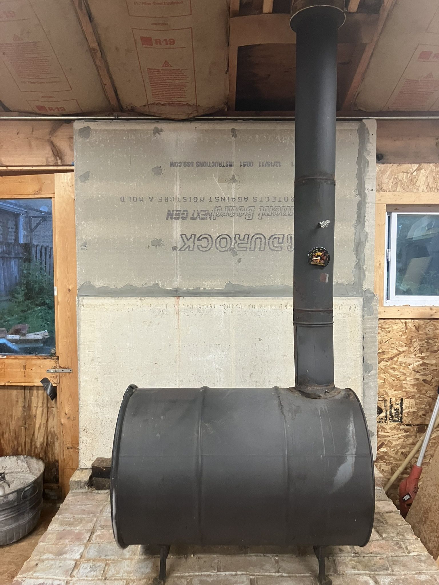 Woodburning barrel stove with chimney