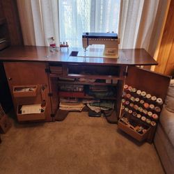 Singer Sewing Machine And Cabinet