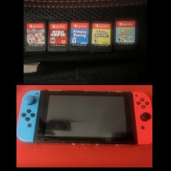 Used Nintendo Switch with carrying case & 5 Games