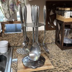 Princes house vase y cucharas para servir