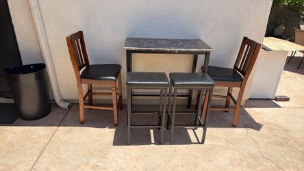 Small high Dining table and two bar stools 2 high chairs