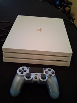 Pre-owned  Playstation  4 pro  1 TB Glacer  white  Console  Comes  with  Controller  & all Cords needed  Comes with  original  Box  works great  Comes