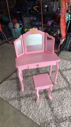 Pink vanity with stool
