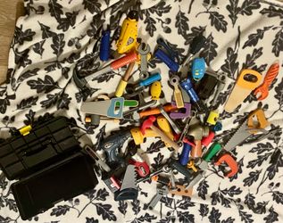 Tote full of toy tools. 25451 Boxelder dr 92563