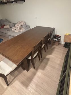 8 seater dining room table with bench and 5 chairs