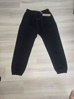 Black essentials fear of god pants in size L