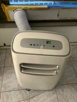 Portable air conditioner — works great, just an older unit.