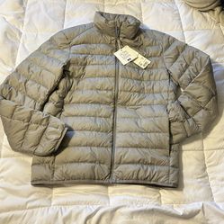 Uniqlo Ultra Light Down Jacket Kid size XS(chest32-35) w/carry Pouch