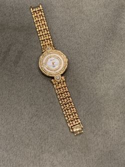 Ladies Watch. With Mother Of Pearl Face. Rose Gold Color.  Like New Condition. 