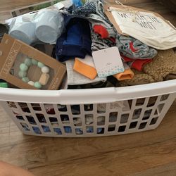 Basket Full Of Clothes And Blankets