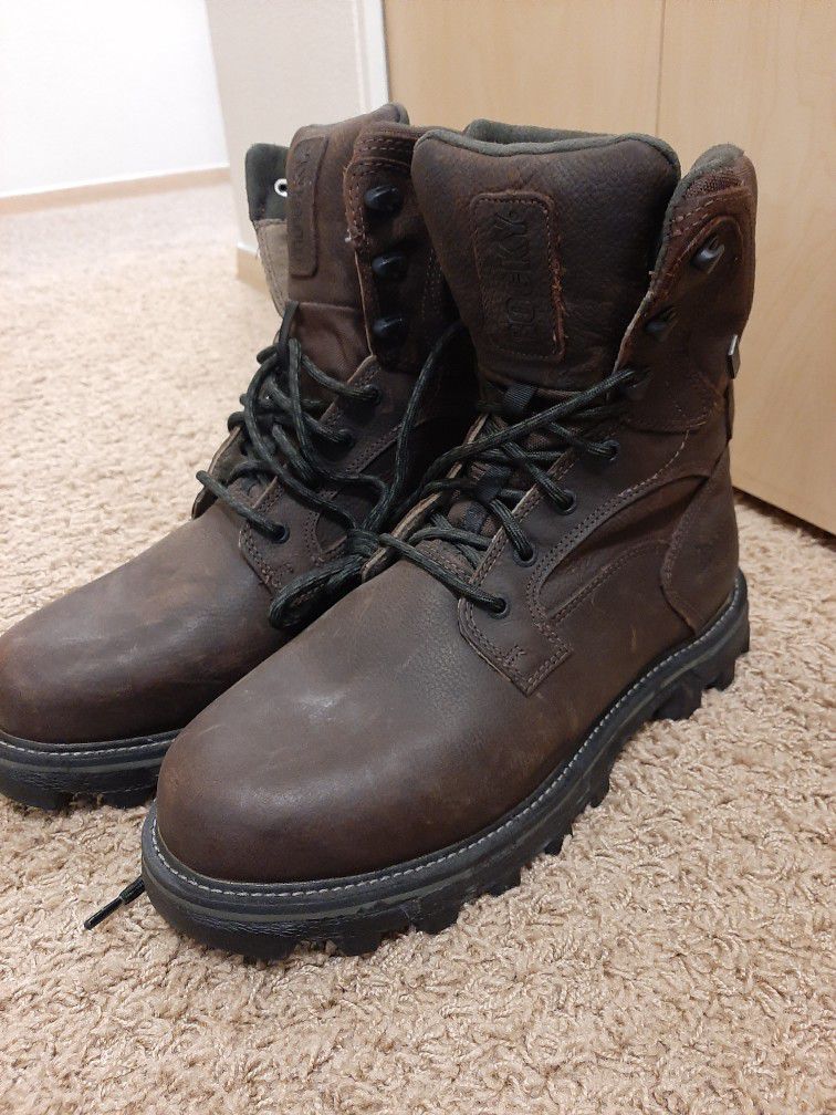 Men's Rocky leather waterproof boots.
Size 11,5. Brand New. Never used.