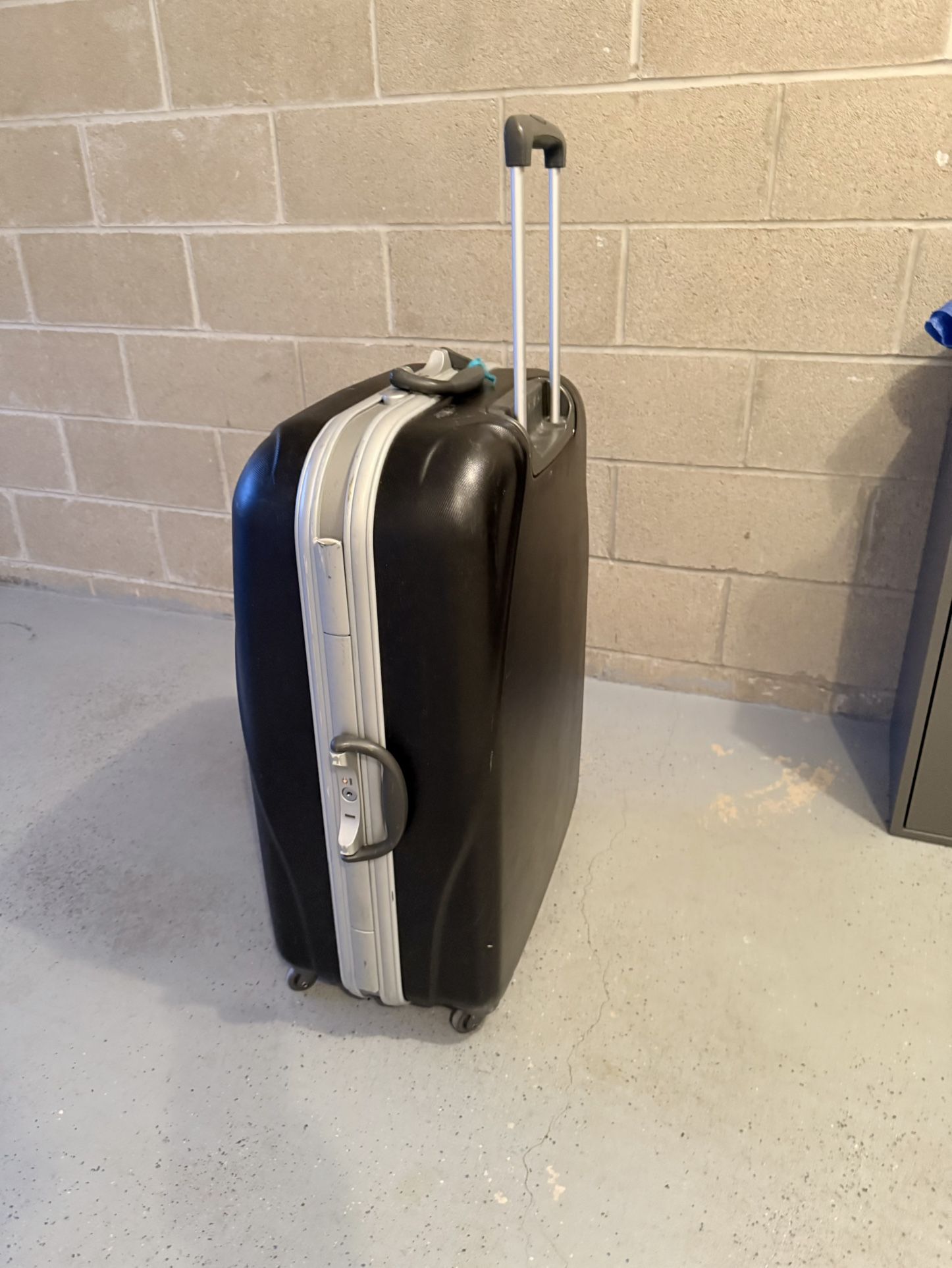 Classic Samsonite Hard Shell Suitcase. Used 1-2 times. Excellent condition. Made of durable, impact-resistant material and outfitted with four wheels
