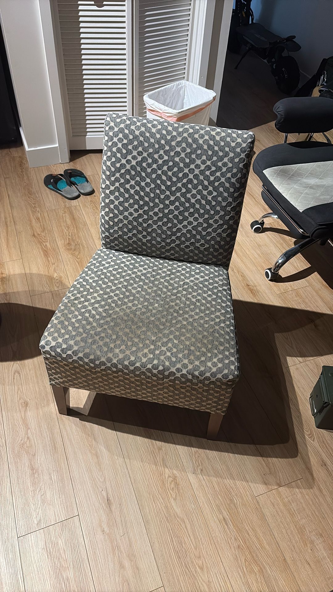 1 Grey and white pattern chair. 