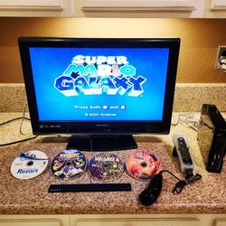 Excellent Nintendo Wii Set Complete with some great games included!! (Read the Description plz