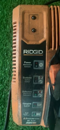 Ridgid Rapid Max Battery Charger designed to charge 12V, 14.4V, and 18V power tool batteries.