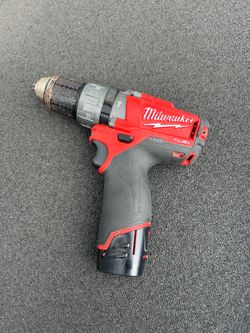 Milwaukee Fuel M12 Hammer Drill, Charger and two batteries