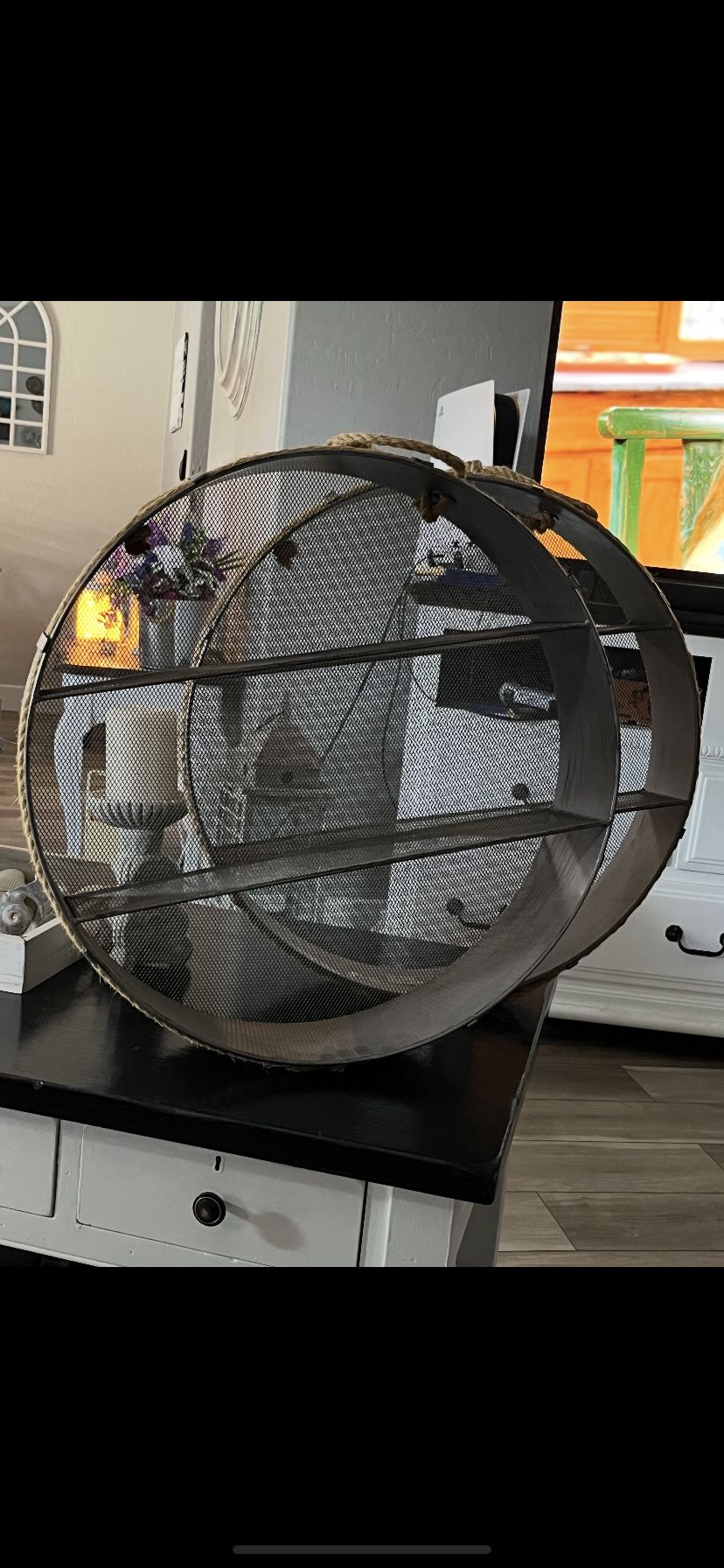 round metal wall shelf with a mesh backing and rope detailing. x 2