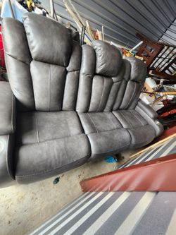 Ashley leather sofa, electric end recliners excellent condition