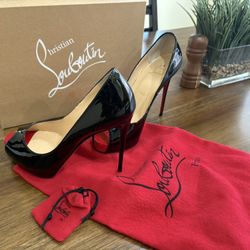 Christian Louboutin “Red Bottoms 